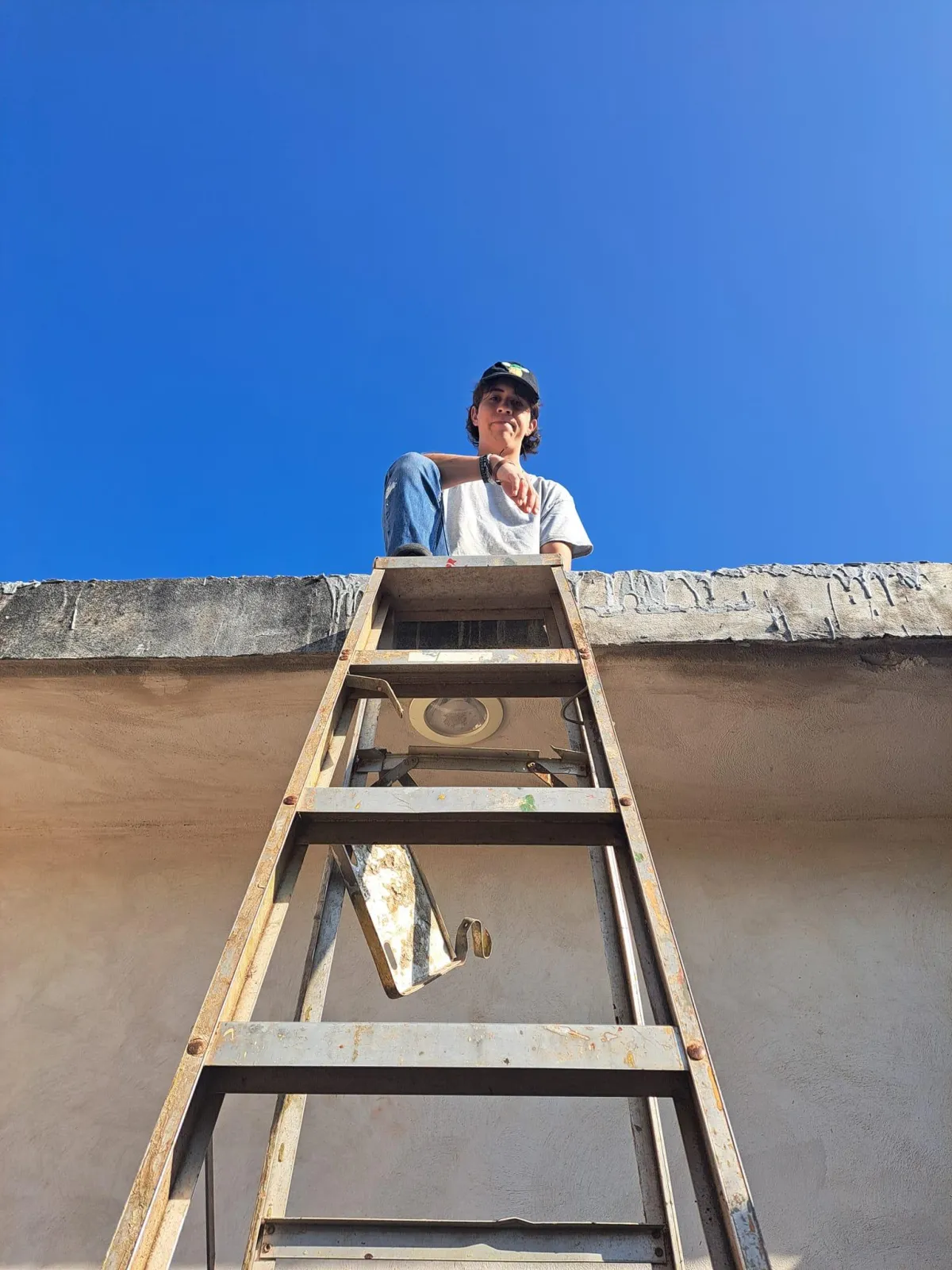 dallin on a ladder