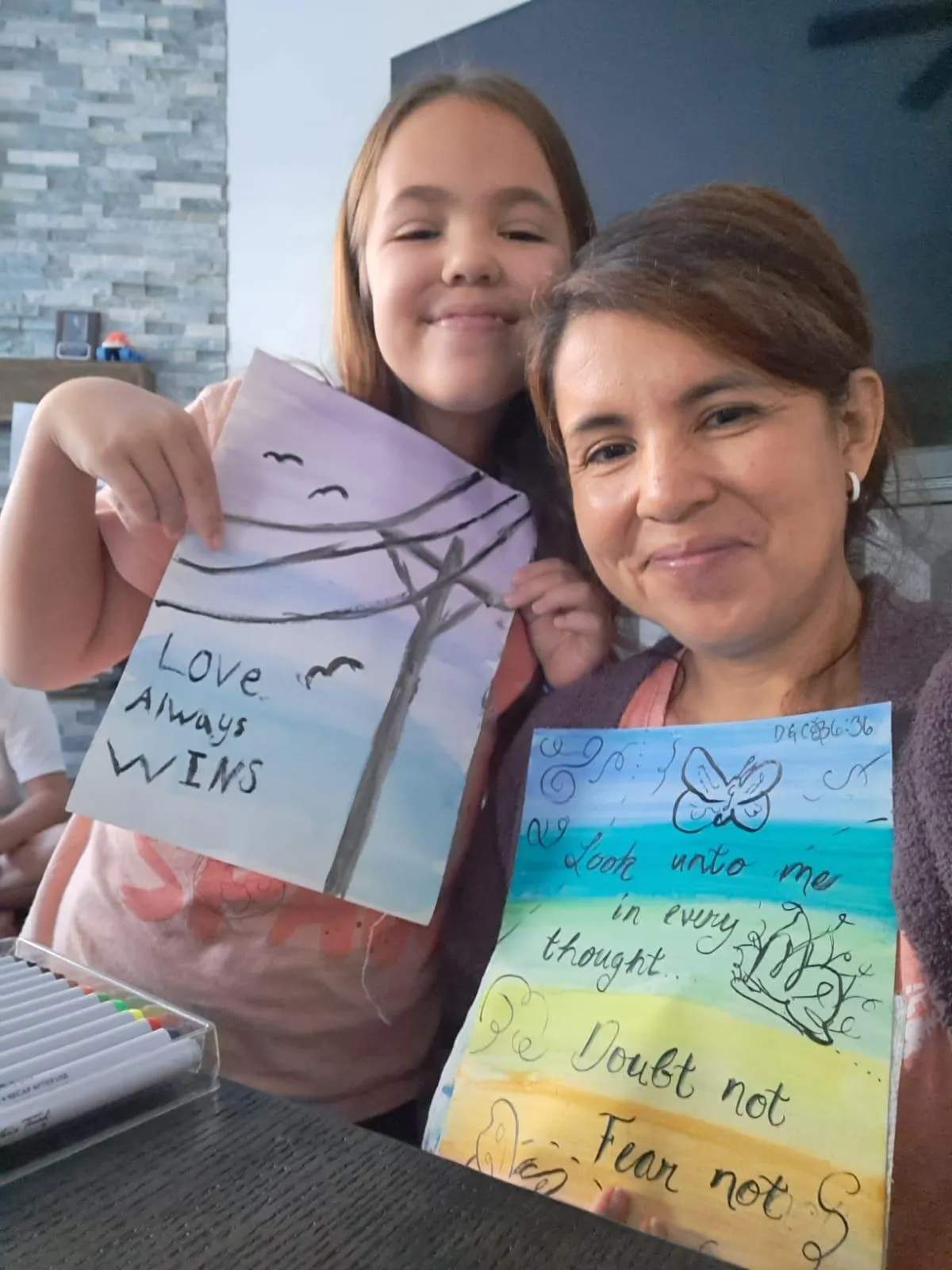 joy and karen with paintings