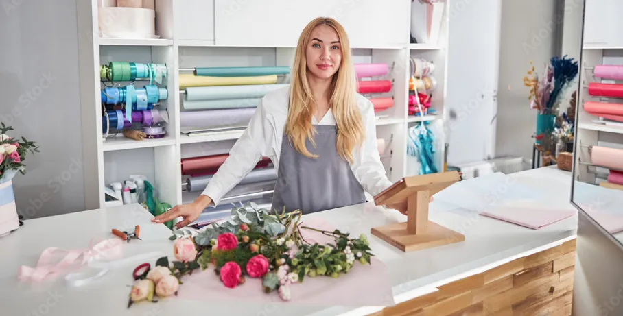 Hey self-employed woman at the counter