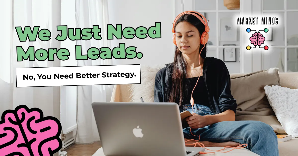 A young person wearing orange headphones sits on a sofa, focused on a laptop. Overlaid text reads "We Just Need More Leads. No, You Need Better Strategy," emphasizing the importance of strategic thinking for lead generation, with the Market Minds Creative logo visible.