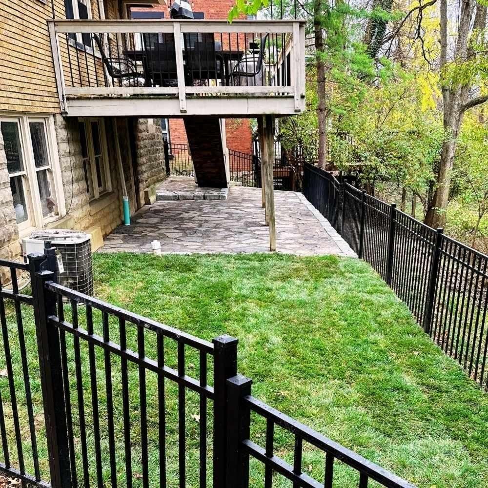 Backyard transformation featuring sod and a new patio in Alexandria, KY.