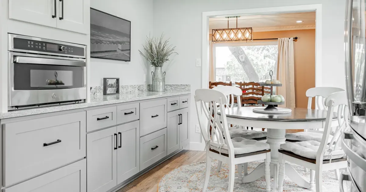 A seamless blend of new kitchen cabinets with existing home decor.
