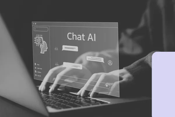 A person typing on a laptop with a digital overlay displaying "Chat AI" on the screen. The image symbolizes the use of artificial intelligence in business, highlighting the potential risks of AI hallucinations and the importance of understanding and managing these challenges effectively.