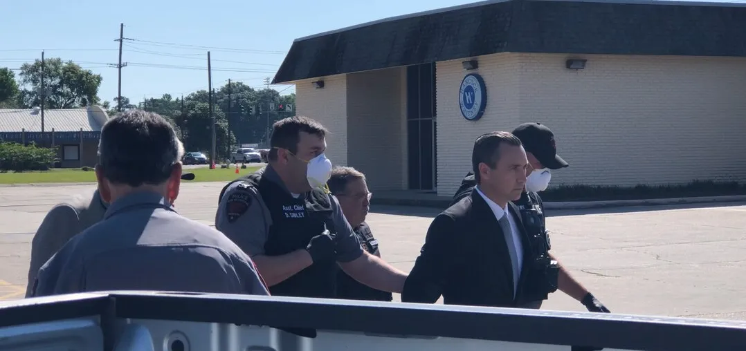 Pastor Tony Spell being arrested