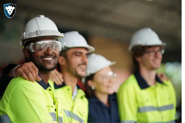 Worker smiling with coworkers