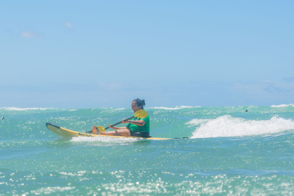 A calm, reflective woman sitting quietly with soft natural light, symbolizing boundaries, self-trust, and sustainable strength.