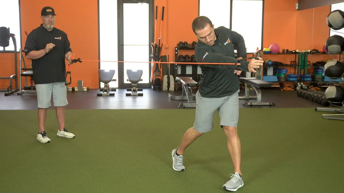 golfer working in gym