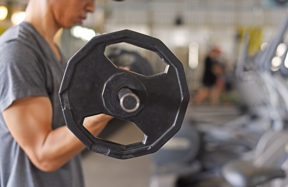 man doing bicep curls