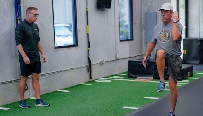 man training for golf