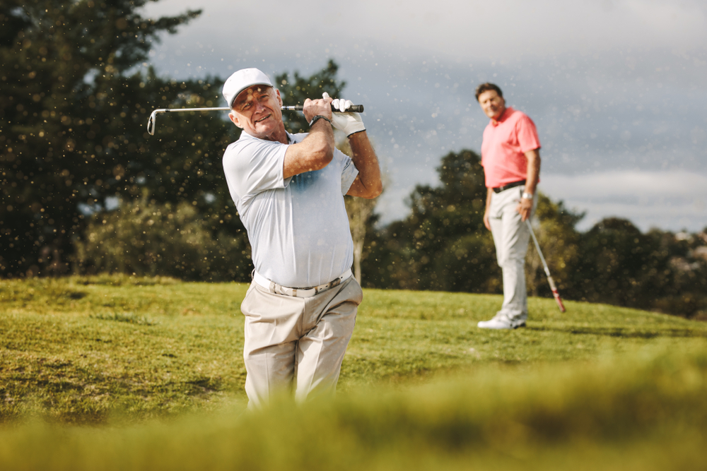 golfer swinging a club
