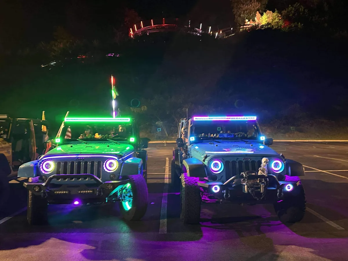 2 Jeep Wranglers with lights