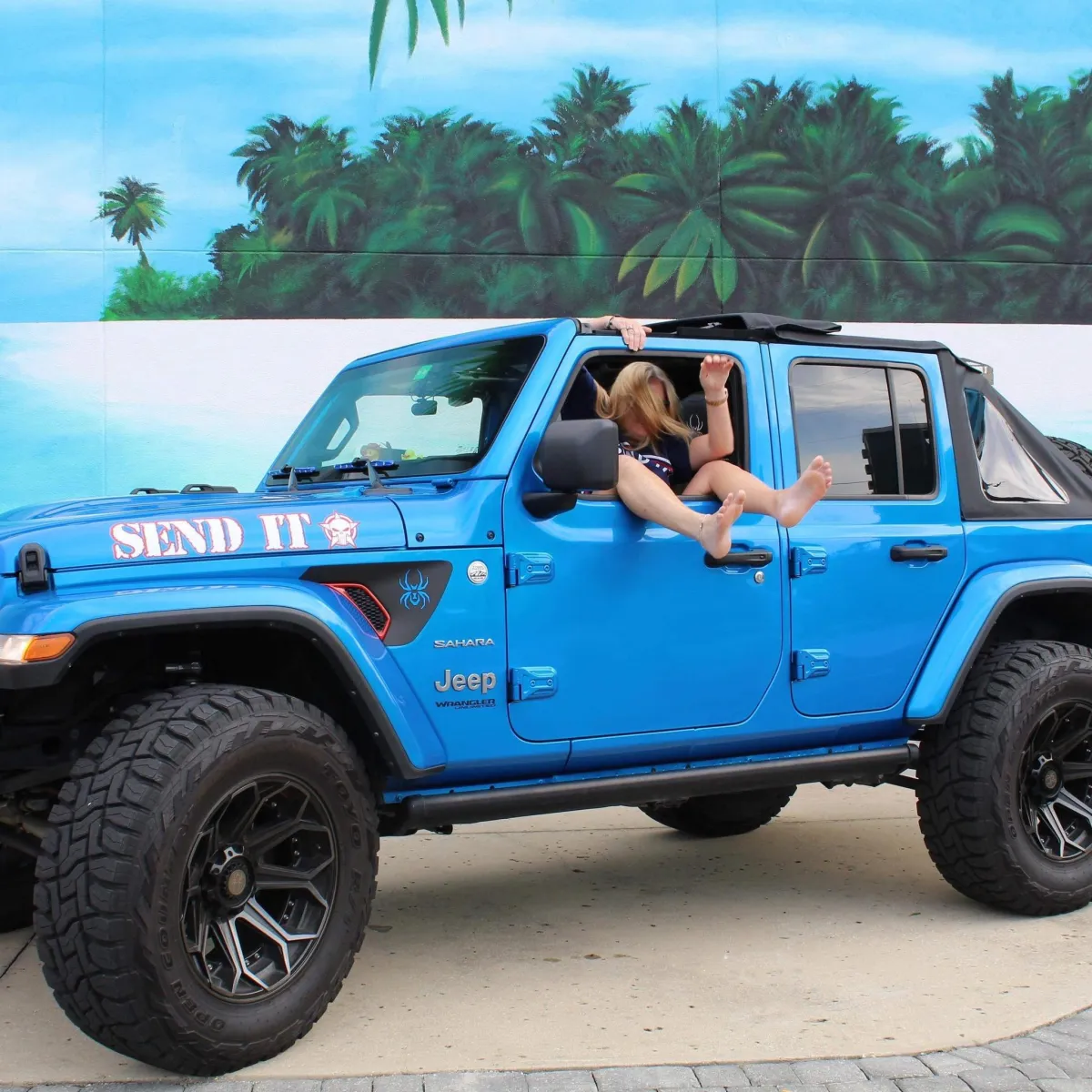 Female Falling Into Jeep Wrangler