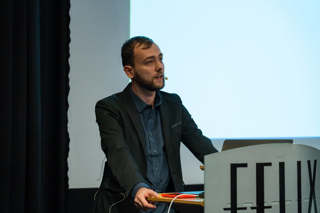 Remi Rousselet presenting Riverpod 2.0 on stage during Flutter Vikings 2022