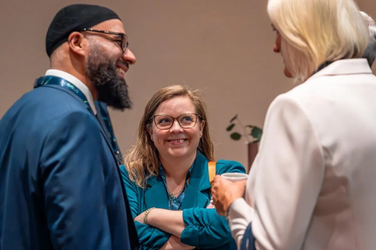 Attendees networking and smiling during a break at the Scotland-Norway Decarbonisation Trade Mission