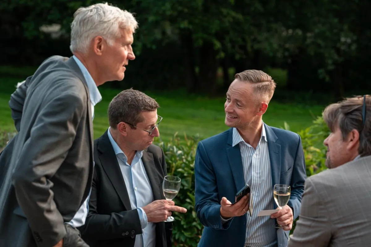 Delegates networking in the garden of the UK Ambassador's residence during the Scotland-Norway trade mission reception