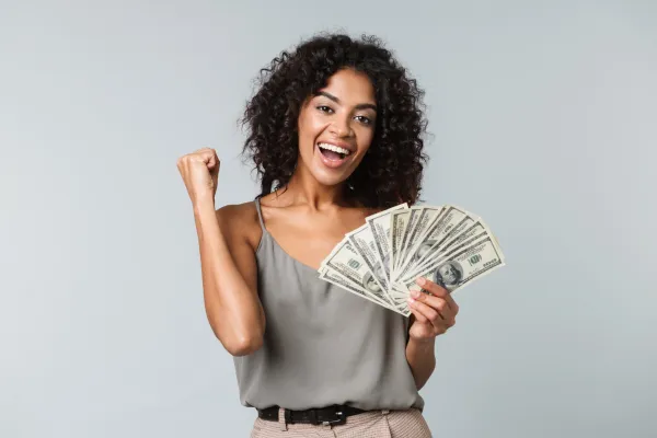 Woman holding money