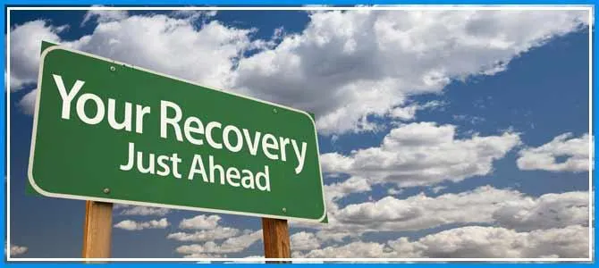 Road sign announcing your recovery is just ahead