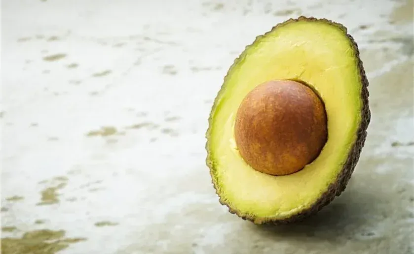 Half of an Avocado with Pit