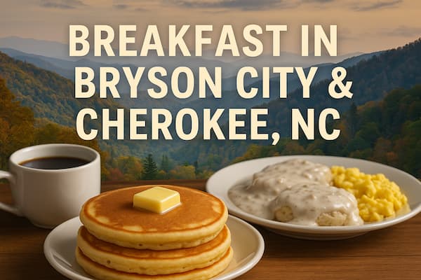 Stack of pancakes with butter, biscuits and gravy, scrambled eggs, and a cup of coffee set on a wooden table, with the misty Smoky Mountains and fall foliage in the background. Text reads 'Breakfast in Bryson City & Cherokee, NC