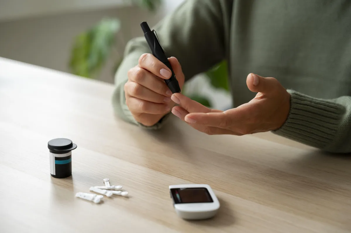 Checking blood sugar levels at home as part of managing insulin resistance and supporting weight loss with Hyper-Ketosis