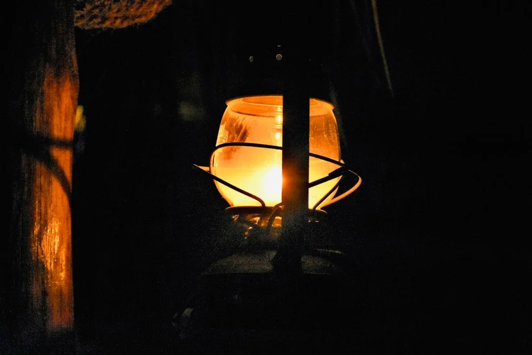 A gas lantern burning in the dark