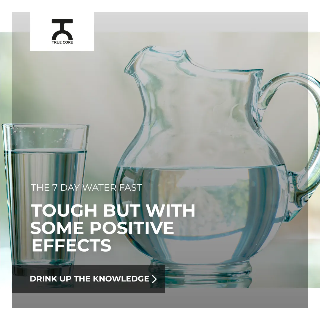 Fresh water jug and glass of water on a clean surface, representing a 7-day water fast.