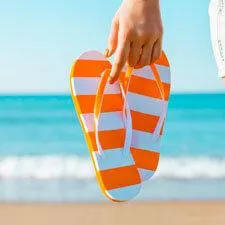 orange and white flip flops