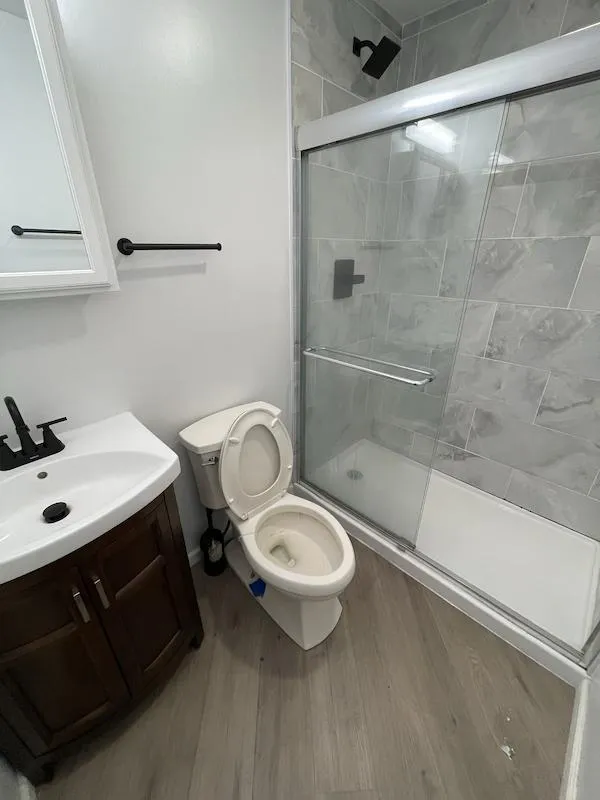 Bathroom in Bolingbrook being cleaned by Rux Cleaning before a tenant moves out.