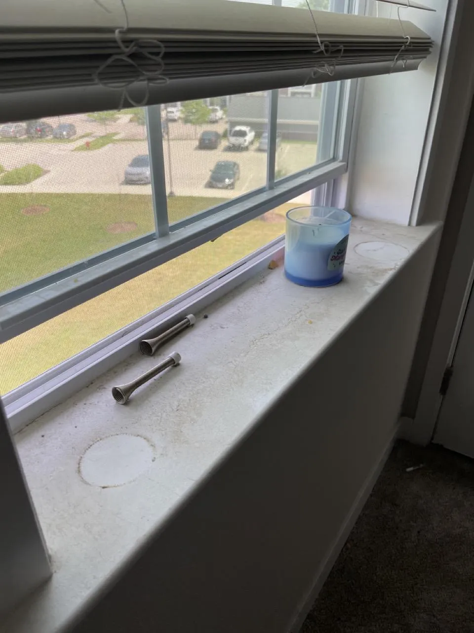 Close-up of Romeoville window sills before being cleaned by our team.