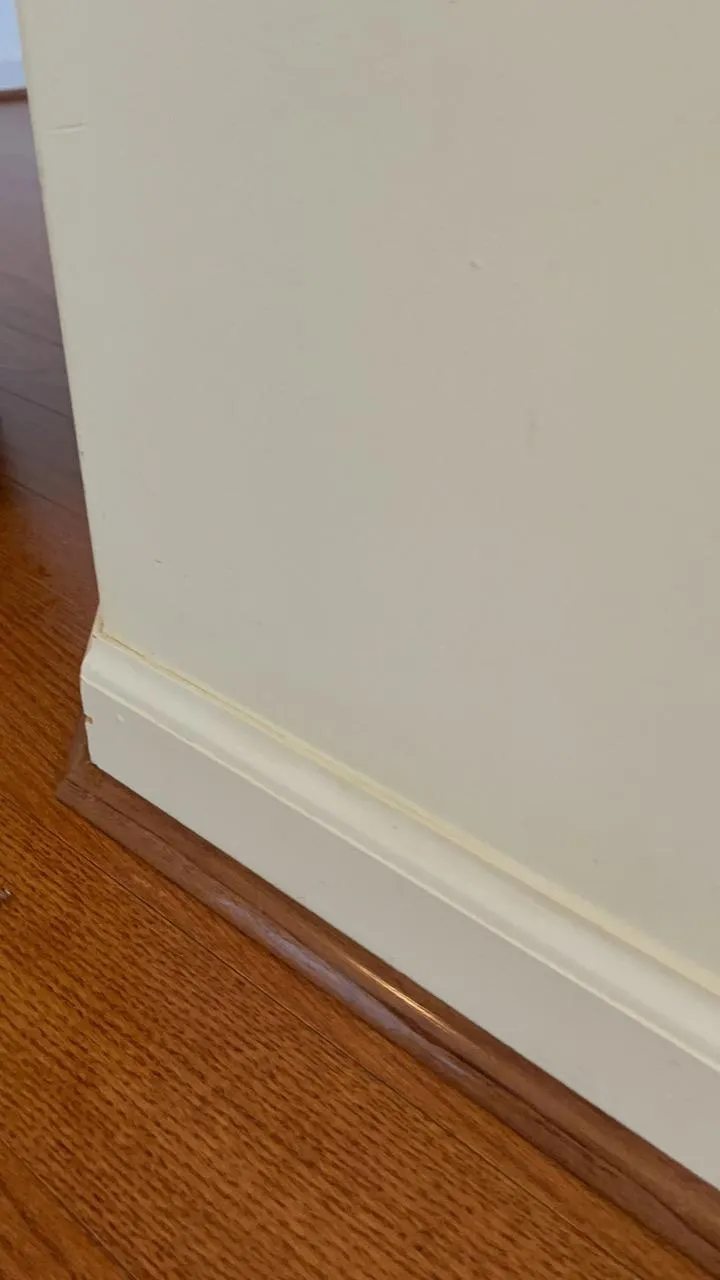 Clean and polished baseboards in a Downers Grove home after deep cleaning.