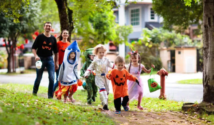 Kids trick-or-treat on Halloween