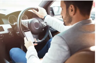Man texting while driving