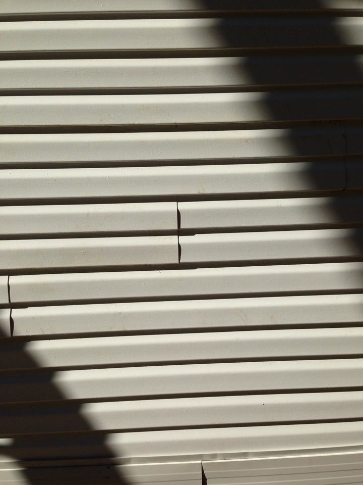 Moisture damage behind siding on a Quad Cities home
