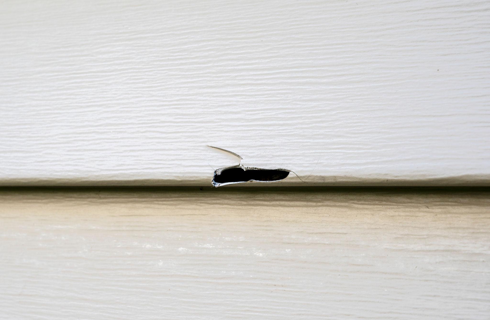 siding damage QC