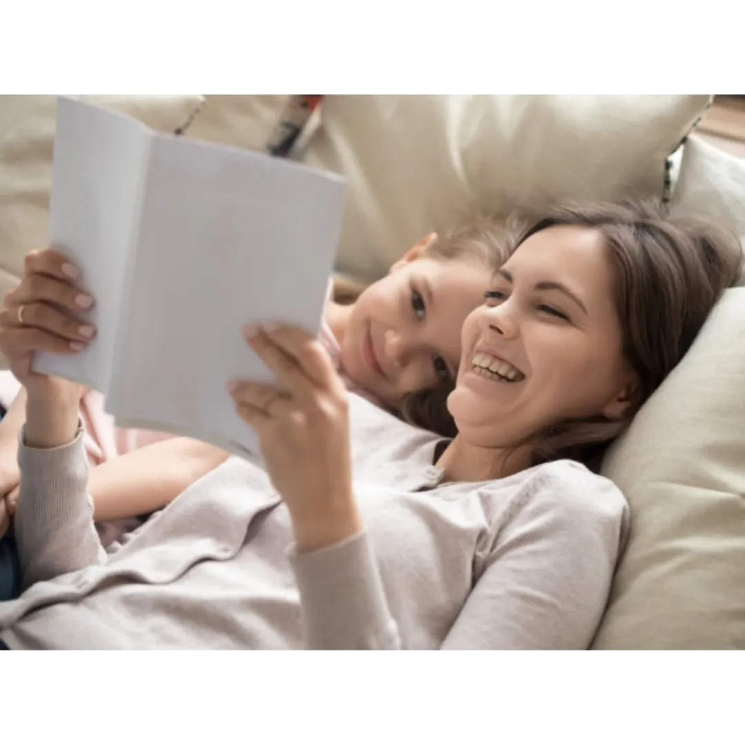 Mother and daughter read a story received in the mail