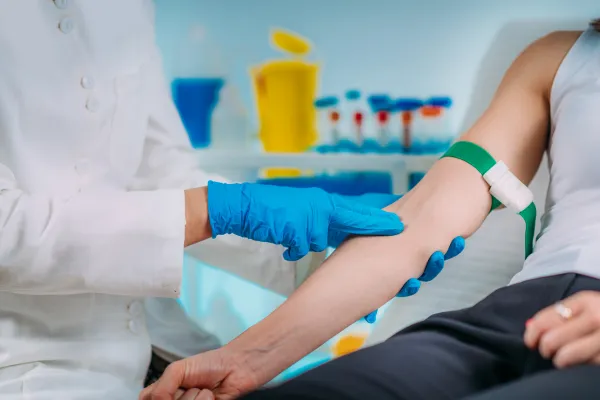 An individual about to have their blood drawn