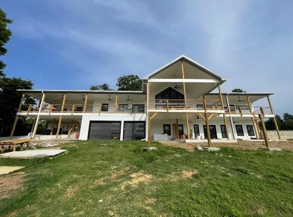 Large modern home with new exterior siding and wood accents in Nashville, Tennessee