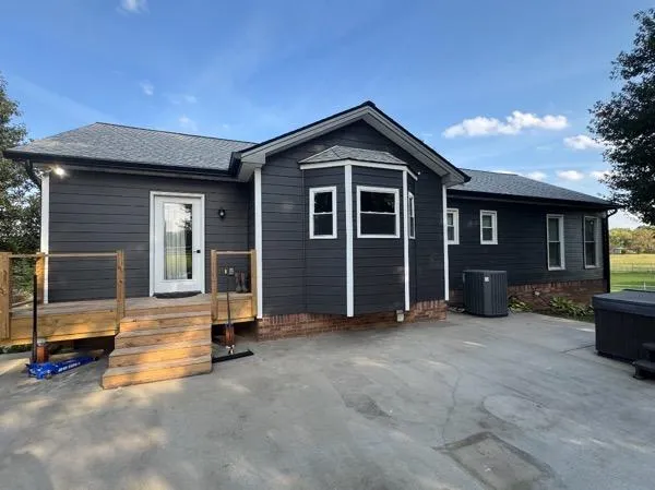 Dark gray Hardie siding installed on a renovated home in Spring Hill, Tennessee