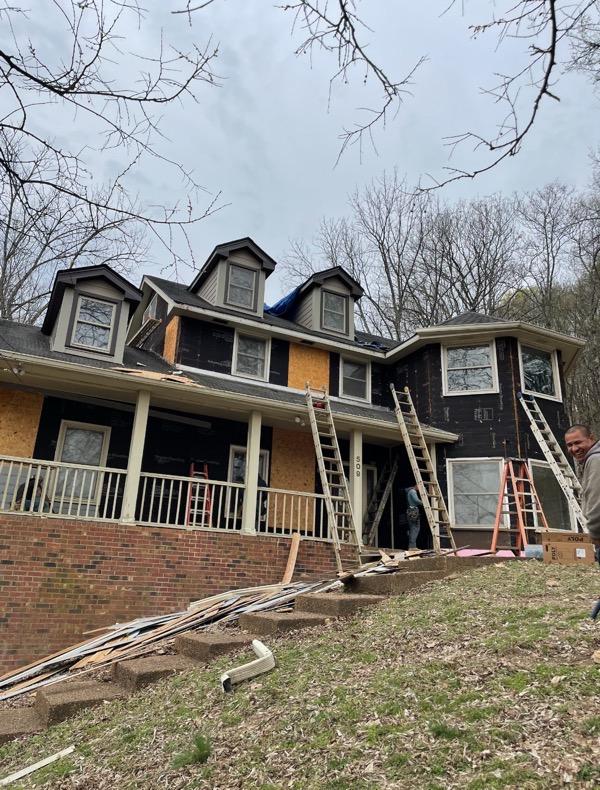 Home exterior siding project in progress in Spring Hill, Tennessee
