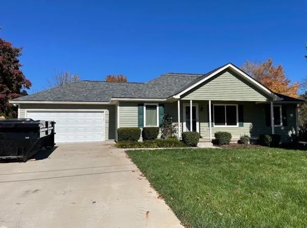 Single-story home with new siding and roof upgrade in Spring Hill, Tennessee