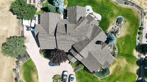 Top view of new roof installation on custom home in Mapleton, Utah.
