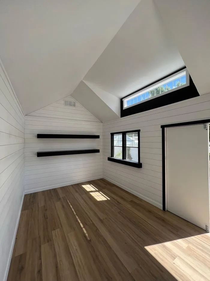 Cozy living room remodel with sectional sofa and neutral walls in Roy UT