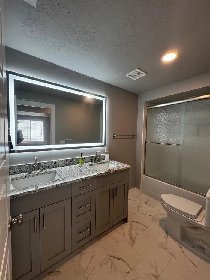 Elegant staircase remodel with carpet steps and open living space in Layton UT