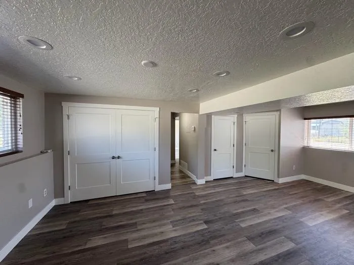 Stylish bathroom remodel with double vanity and LED mirror in Layton UT