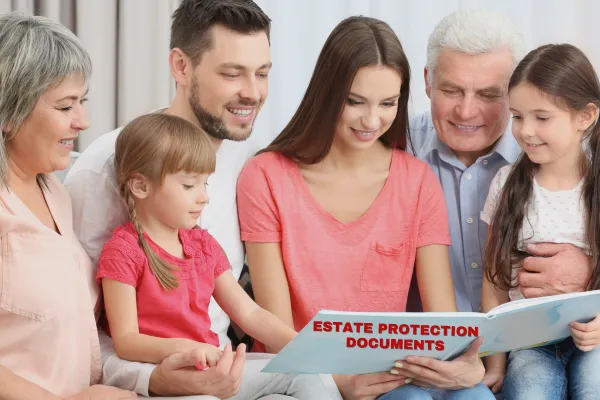 Three generations reviewing family legacy and estate protection documents together