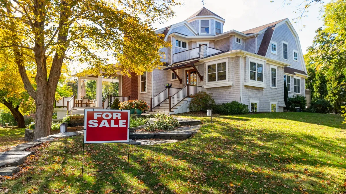 House with for sale Sign