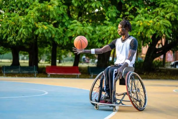 Black man in wheelchair