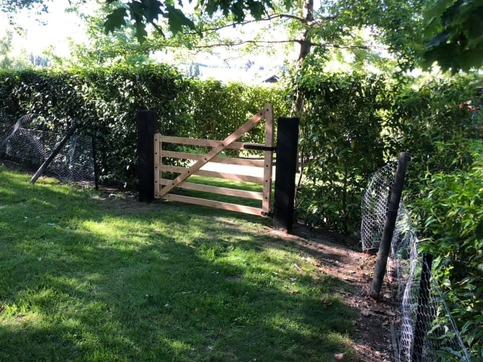 Shaded timber walkway and retaining features, part of G A Building’s outdoor solutions