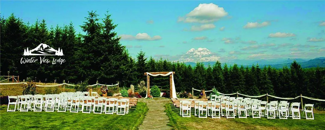 Winter View Lodge Eatonville wedding reception tent with DJ Quick Hire lighting