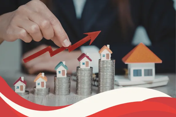 Group of diverse individuals discussing real estate investment strategies in a modern office setting